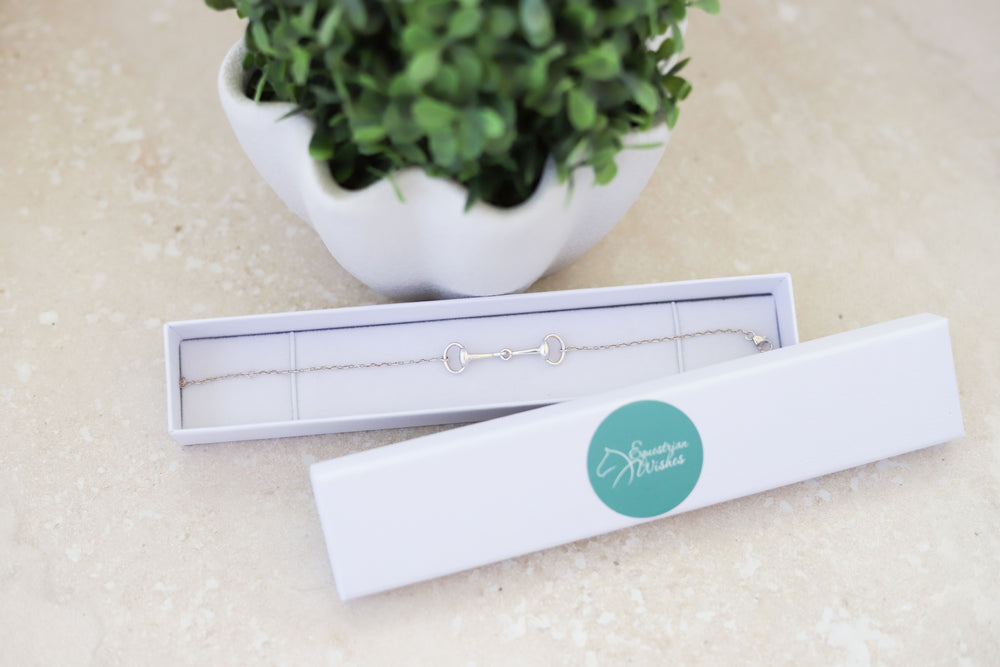 Sterling silver snaffle bit bracelet in white display jewellery box