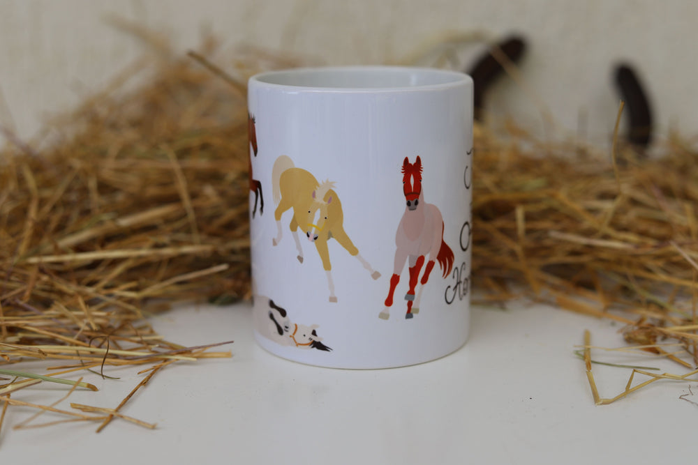 Side view of a white ceramic mug with horse designs - horse lovers gift