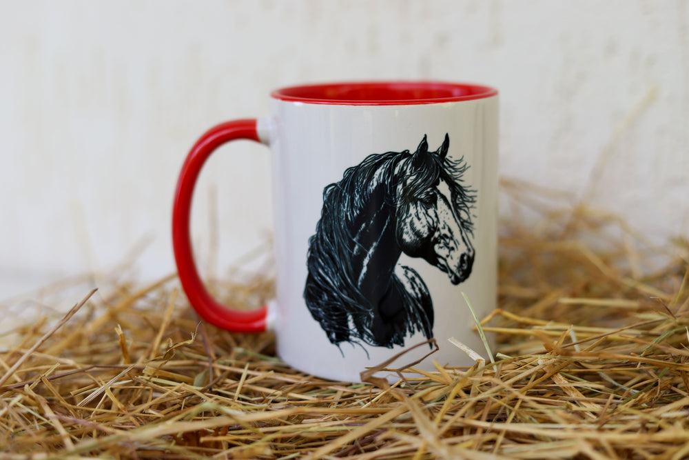 A white ceramic mug with red trim featuring a black horse head art sketch - horse gift Australia