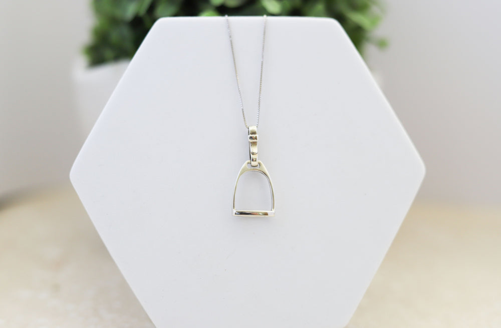 Close up of a Sterling silver stirrup necklace - perfect horse lover gift