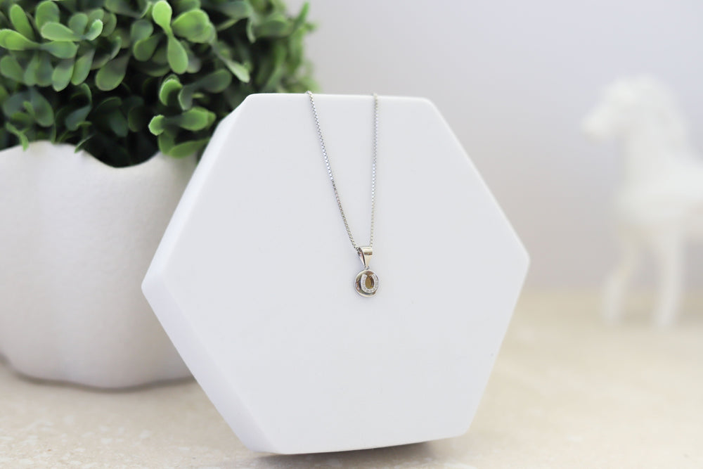A sterling silver horseshoe pendant with sparkly CZ simulated diamonds - Equestrian jewellery gift