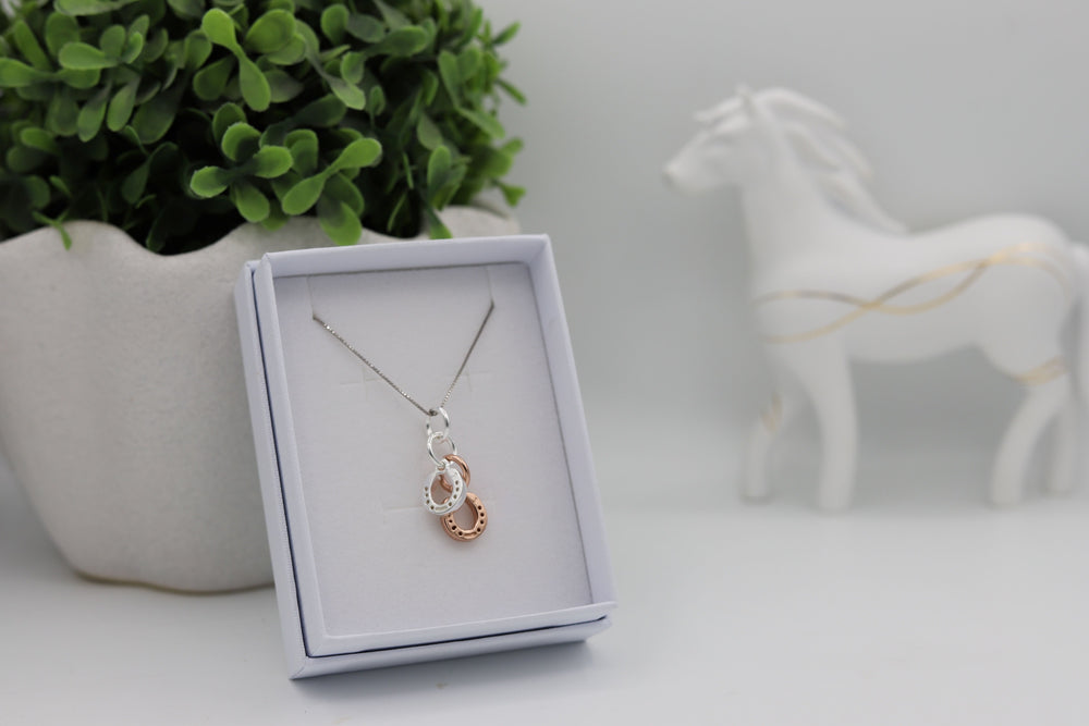 A Sterling sliver rose gold horseshoe pendant - Equestrian jewellery Australia 