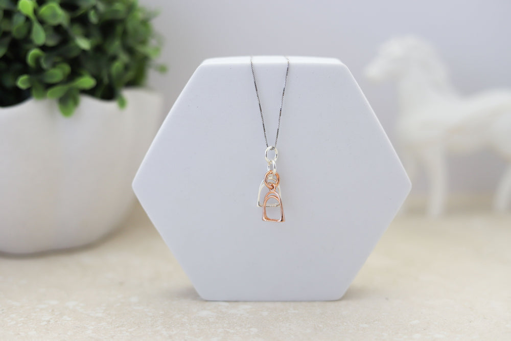 A sterling silver and rose gold stirrup pendant with a sterling silver chain - Equestrian gifts Australia 